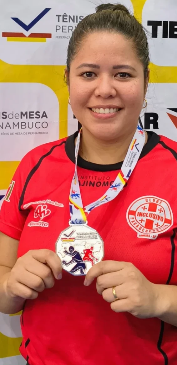 Atleta com sua medalha